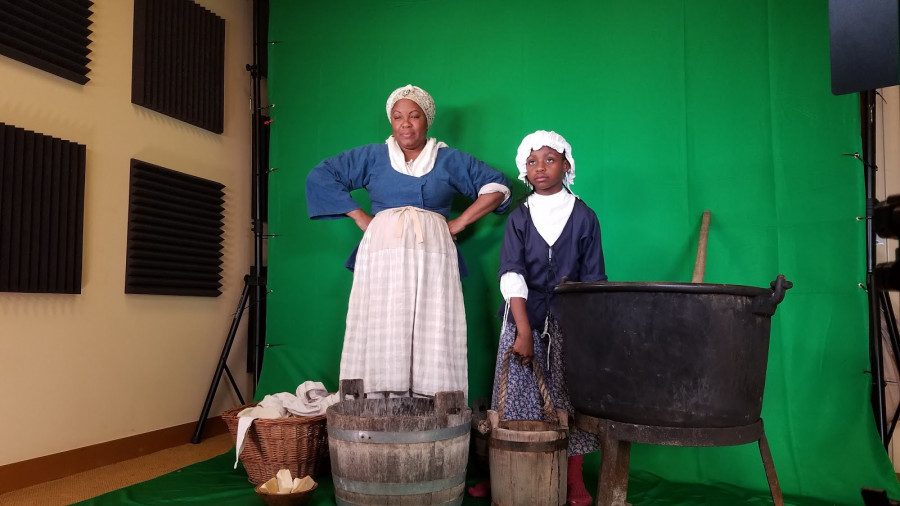 Green-screen capture of two actors playing enslaved laundresses for the AR tour