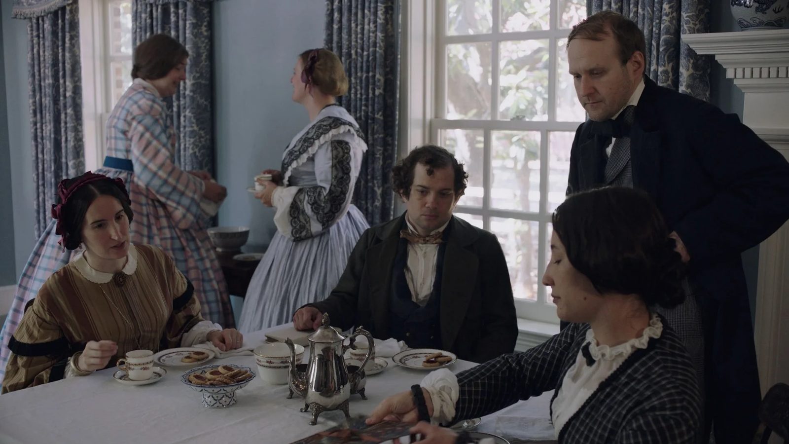 Reenactors portraying the Mount Vernon Ladies' Association meeting at a tea table inside the estate