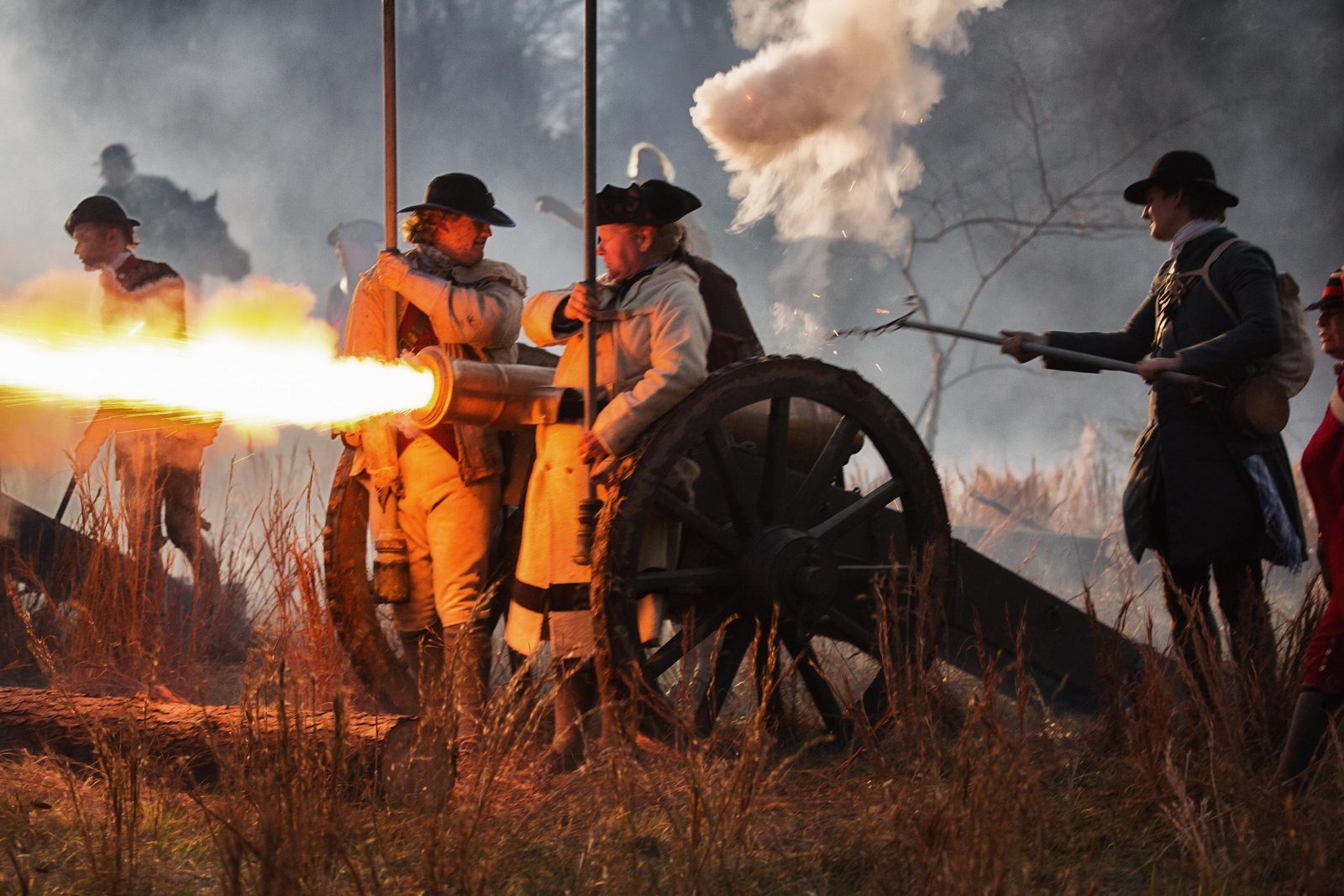 Cannon being fired at dusk during production