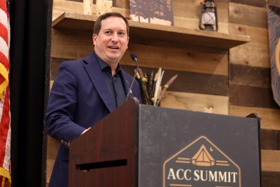 Matt Briney delivering a keynote at the ACC Summit 2025